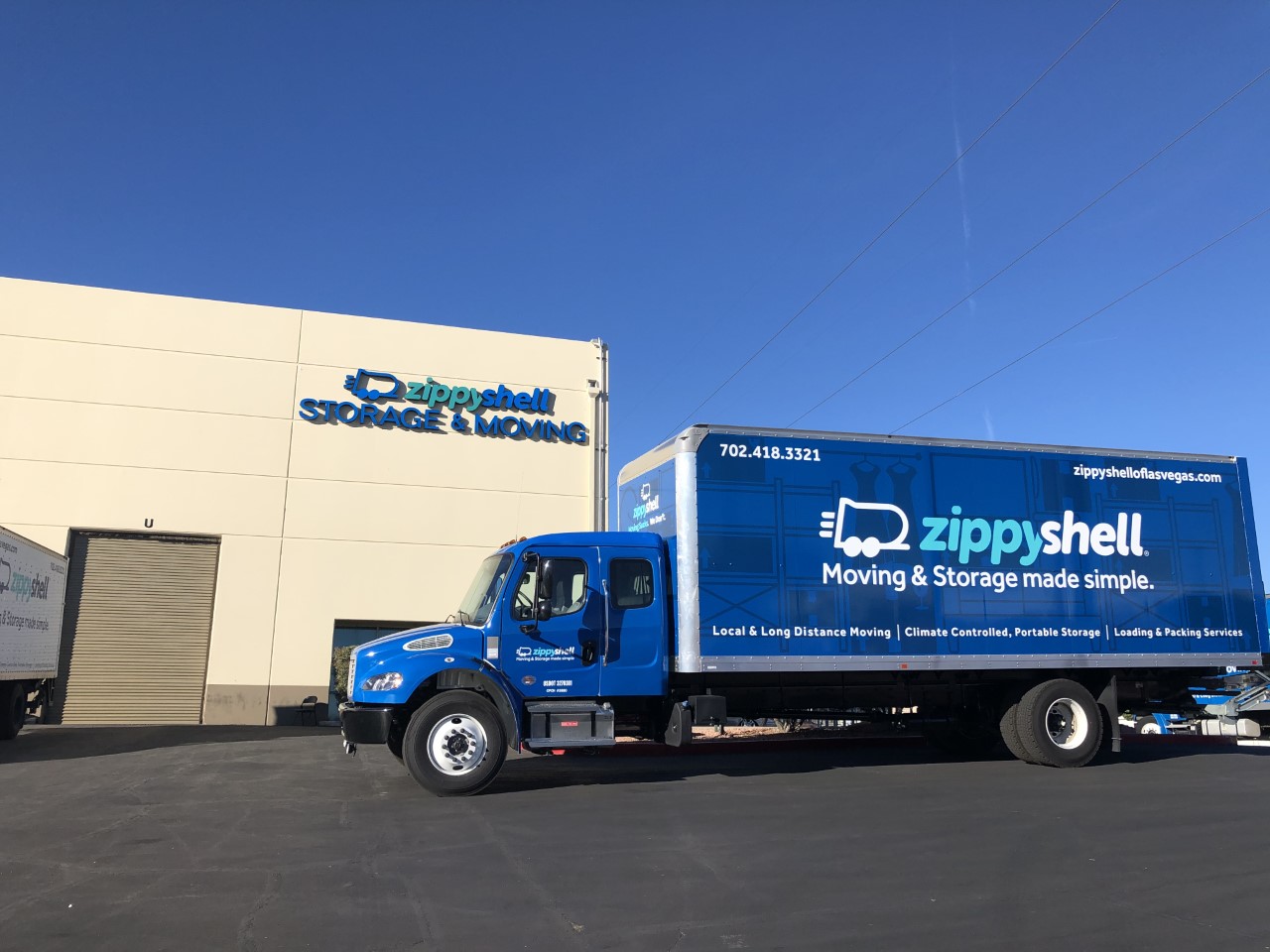blue zippyshell truck outside of storage facility